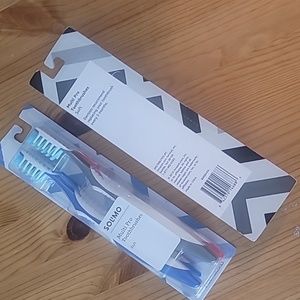 2 packages of 4 each soft toothbrushes